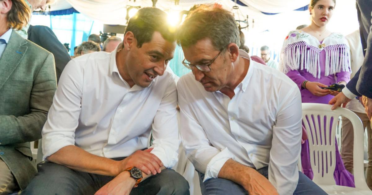 Moreno Bonilla y Núñez Feijóo charlan en un reciente acto