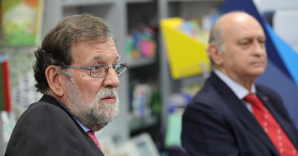 El expresidente del Gobierno Mariano Rajoy y su exministro de Interior Jorge Fernández Díaz, en una imagen de archivo.