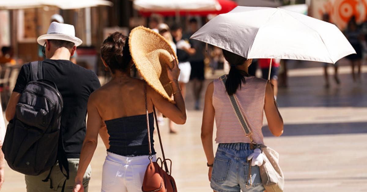 Turistas en Málaga, en plena ola de calor.