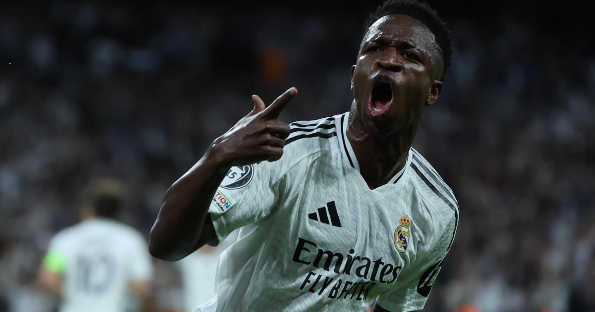 El delantero brasileño del Real Madrid Vinicius Jr. celebrando el primero de sus goles al Borussia Dortmund