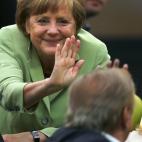 Merkel celebra uno de los goles de Alemania