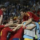 Los jugadores de la selección española celebran su triunfo.