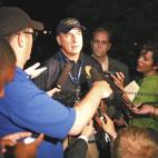 Aurora Police Chief Daniel Oates talks to media at Aurora Mall where as many as 12 people were killed and many injured at a shooting at the Century 16 movie theatre in Aurora, Colo., Friday, July 20, 2012. (Photo credit: AP Photo/Ed Andrieski)