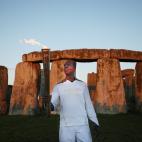 El ganador de cuatro medallas de oro, Michael Johnson, en un amanecer ante Stonehenge. | Getty