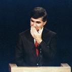 Democratic presidential candidate Michael Dukakis wipes his upper lip during the first presidential debate with his opponent U.S. Vice President George Bush in Winston-Salem, N.C. on Sept. 25, 1988. (AP Photo/Bob Jordan)