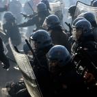 Riot policemen fight with demonstrators during a protest on a day of mobilisation against austerity measures by workers in southern Europe on November 14, 2012 in Rome. Riot police and anti-austerity protesters clashed in Italy on Wednesday as a...