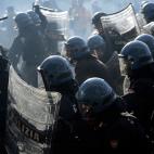 Rio policemen fight with demonstrators during a protest on a day of mobilisation against austerity measures by workers in southern Europe on November 14, 2012 in Rome. Riot police and anti-austerity protesters clashed in Italy on Wednesday as an...