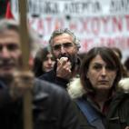 Protesters chant slogans during a union protest in Thessaloniki, Greece, Wednesday, Nov. 14, 2012. Workers across the European Union sought to present a united front against rampant unemployment and government spending cuts Wednesday with a stri...