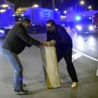 Protesters block the main entrance to Mercabarna, the biggest wholesale market, during a general strike in Barcelona, Spain, Wednesday, Nov. 14, 2012. Spain's main trade unions will stage a general strike, coinciding with similar work stoppages ...