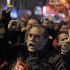 A protester shouts slogans during a general strike in Madrid, Spain, Wednesday, Nov. 14, 2012. Spain's main trade unions stage a general strike, coinciding with similar work stoppages in Portugal and Greece, to protest government-imposed austeri...