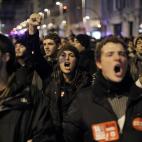 Protesters shout slogans during a general strike in Madrid, Spain, Wednesday, Nov. 14, 2012. Spain's main trade unions stage a general strike, coinciding with similar work stoppages in Portugal and Greece, to protest government-imposed austerity...