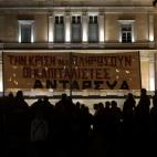 Demonstrators march to the Greek Parliament protesting against austerity measures in Athens on November 11, 2012. Thousands of protesters massed outside Greece's parliament Sunday as lawmakers prepared to vote on a 2013 budget that includes dra...