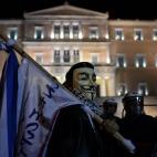 Protesters demonstrate outside the Greek parliament against the new austerity measures in Athens on November 11, 2012. Thousands of protesters massed outside Greece's parliament Sunday as lawmakers prepared to vote on a 2013 budget that includes...