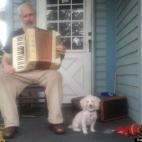 Jamie Zalot:Sandi the Poodle listening to her Daddy play the Accordian