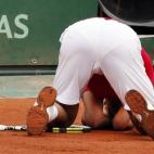El tenista español, en el suelo, rompe a llorar tras su victoria