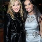Con la actriz Demi Moore en una fiesta antes de los Globos de Oro, el 13 de enero de 2012.