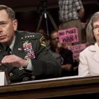 WASHINGTON - JUNE 29: U.S. Gen. David Petraeus, the commander of U.S. forces in the Middle East, speaks during his confirmation hearing before the Senate Armed Services Committee as his wife Holly Petraeus listens on Capitol Hill June 29, 2010 ...