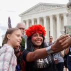 Serlfie con la activista panameña Militza Flaco, en Washington
