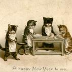 Ellos sí que saben cómo felicitar las fiestas: gatitos con delantales, sartenes y con las manos en la masa. Desean un feliz año... 1880.