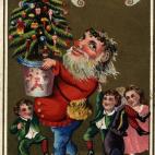 Los niños, siempre corriendo a por los regalos y el árbol (por lo menos desde 1885).