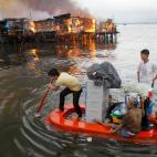 11 mayo 2012 Al menos 1.000 casas Almeno 1.000 casas fueron arrasadas por el fuego, dejando a 5.000 sin techo en un 'slum' de Manila (Filipinas)