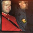 FILE - In this July 25, 2011 file photo, Norway's twin terror attacks suspect Anders Behring Breivik, left, sits in an armored police vehicle after leaving the courthouse following a hearing in Oslo. Anders Behring Breivik the Norwegian right-wi...