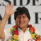 Bolivia President Evo Morales waves as he arrives during his visit in Bergamo, near Milan, Italy, Thursday, Sept. 5, 2013. (AP Photo/Antonio Calanni)