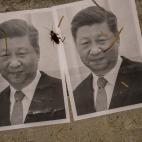 Carteles contra el presidente Xi Jinping en Hong Kong, en una protesta por los uigur
