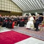 RESTRICTED TO EDITORIAL USE - MANDATORY CREDIT 'AFP PHOTO / OSSERVATORE ROMANO' - NO MARKETING NO ADVERTISING CAMPAIGNS - DISTRIBUTED AS A SERVICE TO CLIENTS Italy's president Giorgio Napolitano (2nd R) sits flanked by Pope Benedict XVI (C) at a...