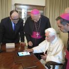 FILE - In this June 28, 2011 file photo, Pope Benedict XVI touches a touchpad to send a tweet for the launch of the Vatican news information portal "www.news.va", at the Vatican. The Vatican said Monday, Dec. 3, 2012, that Pope Benedict XVI will...