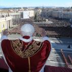 In this photo provided by the Vatican paper L'Osservatore Romano, Pope Benedict XVI delivers his "Urbi et Orbi" (to the City and to the World) speech from the central loggia of St. Peter's Basilica, at the Vatican, Sunday, Dec. 25, 2011. Benedic...