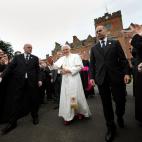 BIRMINGHAM, ENGLAND - SEPTEMBER 19: Pope Benedict XVI shakes hands as he leaves Oscott College, the home of the Seminary of the Archdiocese of Birmingham, where he met with the Bishops of England, Scotland and Wales, on September 19, 2010 in Bi...