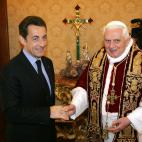 (FILES) A picture taken on December 20, 2007 shows Pope Benedict XVI shaking hands with French president Nicolas Sarkozy during a private audience at the Vatican. Nicolas Sarkozy will make a visit on October 8, 2010 at the Vatican to meet pope B...