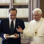 VATICAN CITY - NOVEMBER 19: Pope Benedict XVI (R) talks with Italian Prime Minister Sivio Berlusconi during their meeting November 19, 2005 in Vatican City. This is the first meeting between the two since teh Pope's election. (Photo by Alberto...