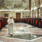 VATICAN CITY, Vatican: Cardinals applaud Pope Benedict XVI during a meeting with the cardinals of the Roman Catholic Church 22 April 2005 in the Vatican City. The Popewarmly thanked the cardinals telling them he needed their advice and support ...