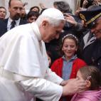 VATICAN CITY - APRIL 20: Pope Benedict XVI (L) greets well-wishers April 20, 2005 in Vatican City. Cardinal Ratzinger was elected the new Pope on April 19. (Photo by Arturo Mari-Pool/Getty Images)