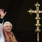 Germany's Joseph Ratzinger, the new Pope Benedict XVI, waves to crowd from the window of St Peter's Basilica's main balcony after being elected the 265th pope of the Roman Catholic Church 19 April 2005 at the Vatican City. (Photo credit should r...