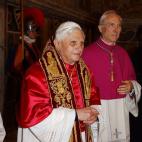 VATICAN CITY, VATICAN - APRIL 19: Newly elected Pope Joseph Ratzinger (L) as Benedetto XVI leaves the Sistine Chapel to appear on the central balcony of St Peter's Basilica April 19, 2005 in Vatican City. The 265th Pope will lead the world's 1...