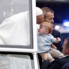 PHILADELPHIA, PA - SEPTEMBER 27: Pope Francis blesses a baby in the Popemobile during a parade September 27, 2015 in Philadelphia, Pennsylvania. Pope Francis is in Philadelphia for the last leg of his six-day visit to the U.S. (Photo bt Alex Br...