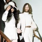 Beatle John Lennon, right, and Yoko Ono are shown circa 1969 at an unknown location. (AP Photo)