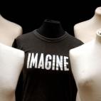 A t-shirt owned by John Lennon stands on display, 2005.