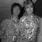 John Lennon with wife Cynthia Lennon at Heathrow Airport in London