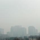 Tall buildings are shrouded in smog in downtown Salt Lake City, Utah, U.S. December 12, 2017. Sometimes during the winter, temperature inversions form in Salt Lake Valley, when the upper air temperature is warmer than the air on the valley floor...