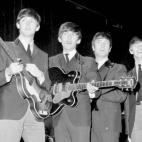 The Beatles during rehearsals for the 1963 Royal Variety Performance, at the Prince of Wales Theatre in London. L-R: Paul McCartney, George Harrison, John Lennon and Ringo Starr.    * 12/11/2000:  The band will unleash an album widely expected t...