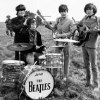 NOTE BLACK AND WHITE ONLY File photo dated 03/05/1965 of (left to right) John Lennon, Ringo Star, Paul McCartney and George Harrison as the Beatles have held off artist such as Elvis Presley and Madonna to be declared the biggest selling singles...