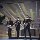 The Beatles, performing on the Ed Sullivan Show, New York City, 9th February 1964. Left to right: Paul McCartney, George Harrison (1943 - 2001), John Lennon (1940 - 1980) and Ringo Starr. (Photo by Paul Popper/Popperfoto/Getty Images)