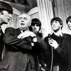19th March 1964, A picture of British pop group the Beatles when they met the British Prime Minister Mr Harold Wilson when he presented them all with silver heart awards which were for show business personalities, (Left to right) John Lennon, Ha...