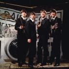 25th November 1963:  Liverpudlian beat combo The Beatles, from left to right Paul McCartney, Ringo Starr, John Lennon (1940 - 1980), and George Harrison (1943 - 2001), performing in front of a camera-shaped drum kit on Granada TV's Late Scene Ex...
