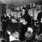 The Beatles in performance at a night spot, April 1963. (Photo by Hulton Archive/Getty Images)