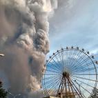 Taal volcano releases ash and smoke during an eruption in Tagaytay, Cavite province south of Manila, Philippines, Sunday. Jan. 12, 2020. A tiny volcano near the Philippine capital that draws many tourists for its picturesque setting in a lake be...